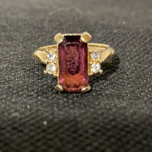 Ring with large red gem